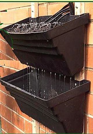 Adding watering systems to vertical pots makes your vertical garden very easy to manage